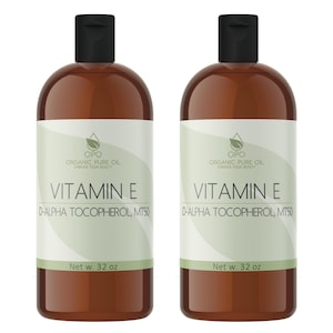 May include: Two brown glass bottles of Vitamin E oil, each with a white label that reads "OPO Organic Pure Oil Enhance Your Beauty" and "Vitamin E D-Alpha Tocopherol, MT50". Each bottle contains 32 fluid ounces.