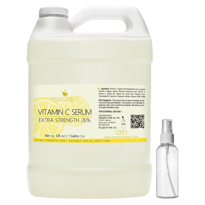 May include: A gallon jug and a small spray bottle of clear vitamin C serum. The label reads "Vitamin C Serum Extra Strength 26%" and "Suitable for all skin types".