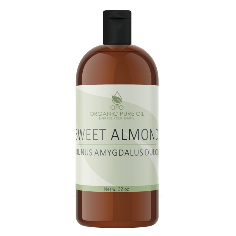 May include: A brown glass bottle with a black cap, labeled "OPO Organic Pure Oil Embrace Your Beauty Sweet Almond Prunus Amygdalus Dulc" and "Net w. 32 oz".