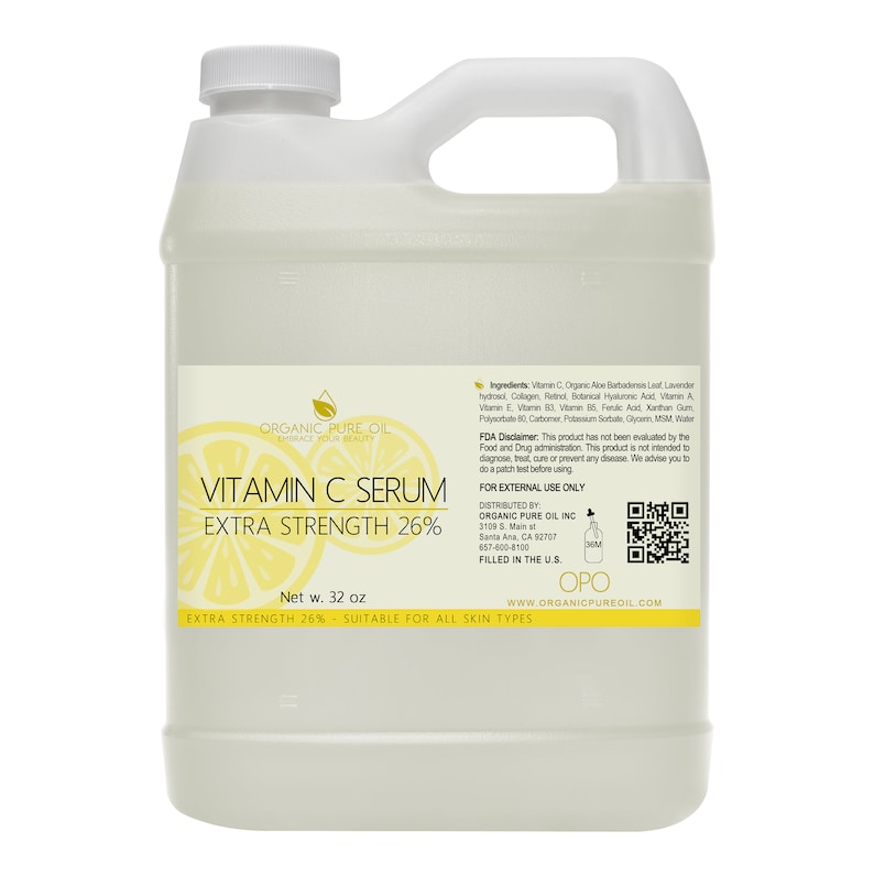 May include: A large, clear plastic bottle of Vitamin C Serum, labelled "Organic Pure Oil" and "Extra Strength 26%". The bottle is 32 fluid ounces and is suitable for all skin types.