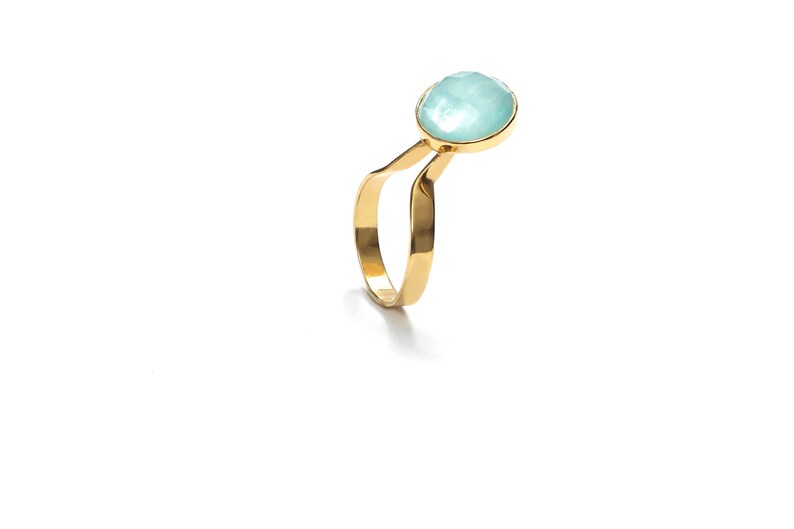 Handmade unique jewelry ring with blue round shaped aquamarine stone