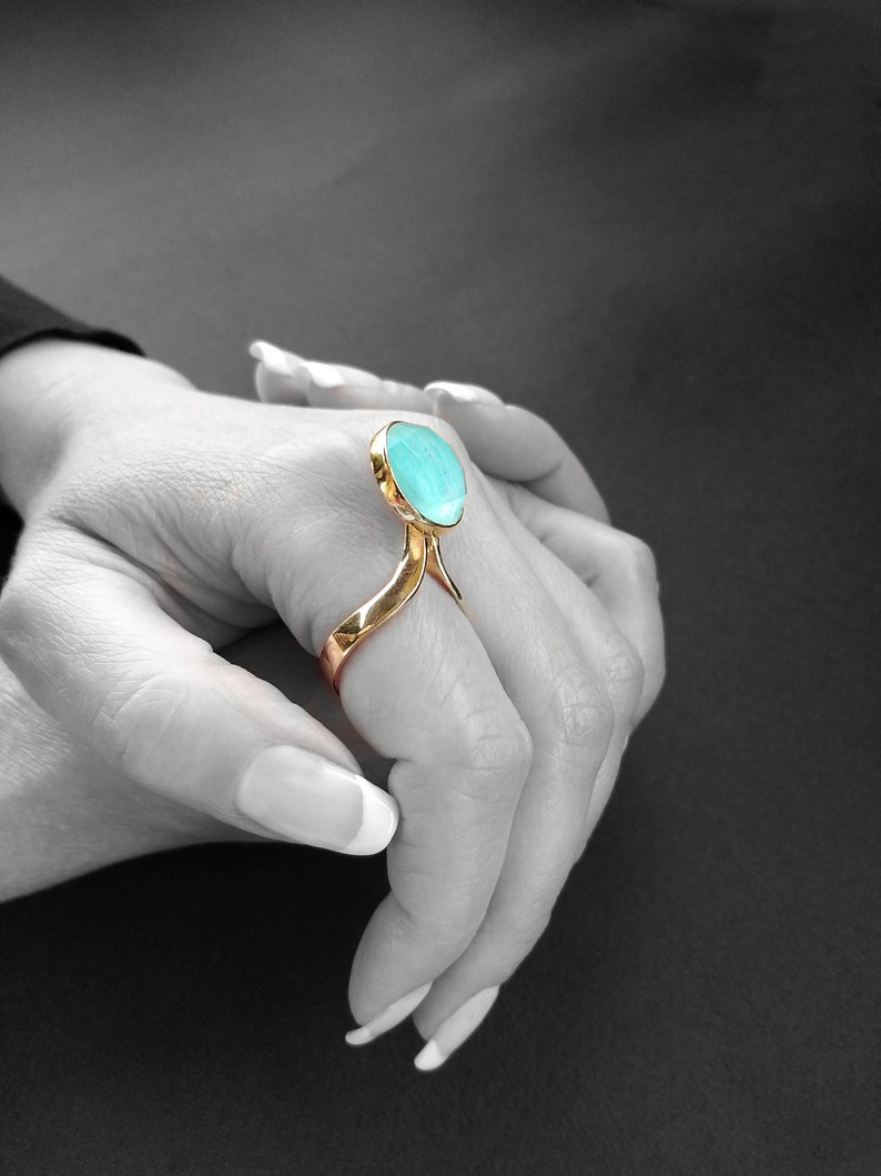 Handmade unique jewelry ring with blue round shaped aquamarine stone