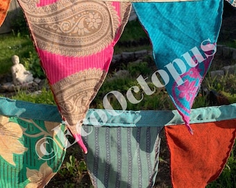 Recycled bunting made from sari off cuts.