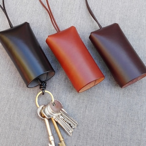 Leather key bell, handmade leather key clochette, key holder in black or brown, key pouch, key lanyard, key case