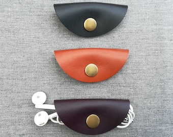 Leather earbud wrap handmade in black, brown, aubergine/eggplant. Headphone holder, cable case, cable keeper, cord organiser, earphone tidy