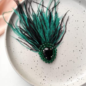 Green - black brooch with ostrich feathers , green crystal brooch, green beaded brooch, feathers stones brooch, black jacket stone brooch