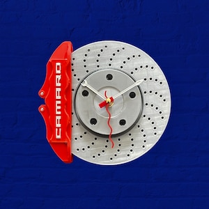 Caliper brake wall clock