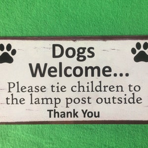 Dogs Welcome Please Tie Children... Funny Sign / Plaque Shabby Chic style background Christmas gift idea