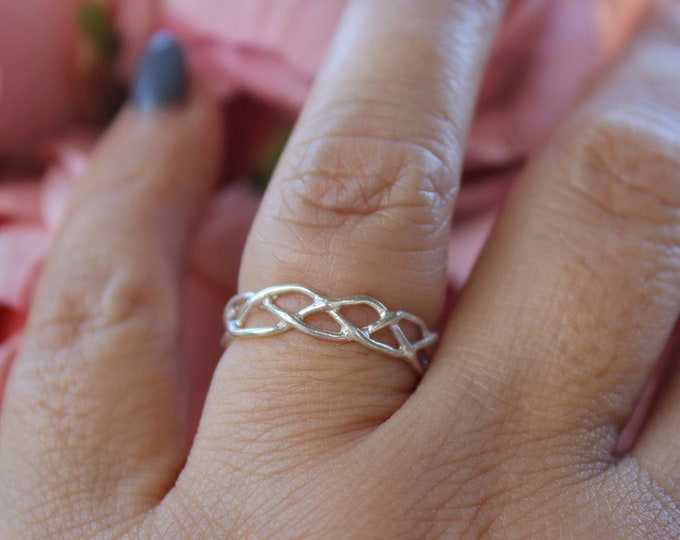 Sterling Silver Band ring . Available size 5
