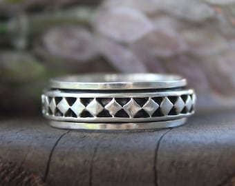 Sterling Silver Spinner Band ring . Available size  10, 11 or 12