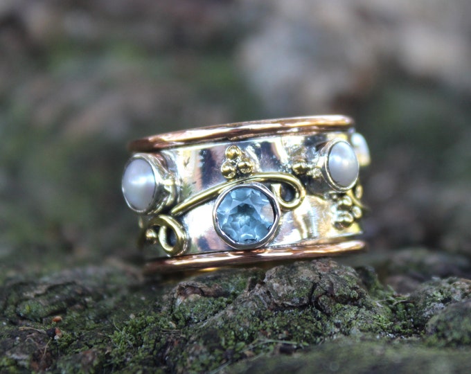 Blue Topaz and Fresh Water Pearl Spinner ring