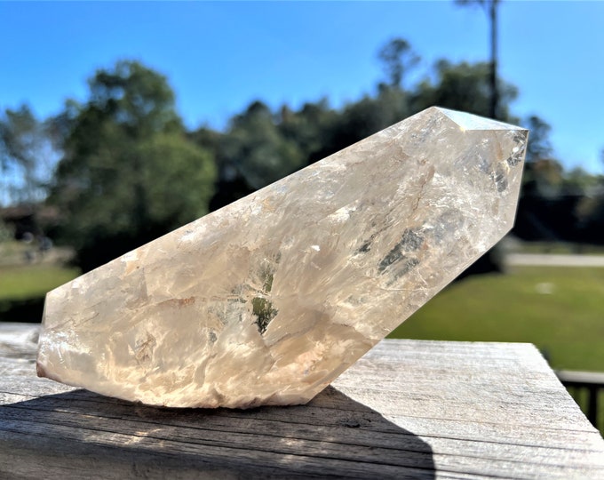 Clear Quartz Point with Rainbow and inclusions inside