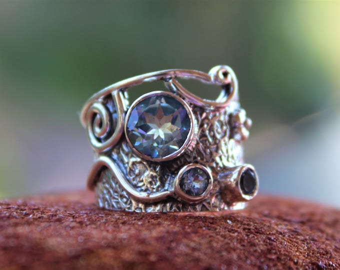 Blue Topaz Sterling Silver Ring. Available size 6 or 7