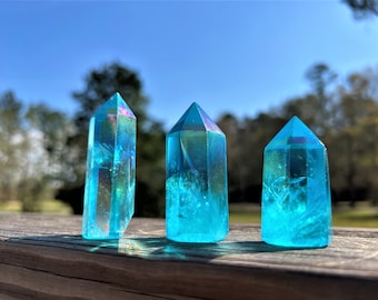 Aqua Aura Quartz Tower: Blue Angel Aura Crystal. IT promotes emotional healing, joy, clarity