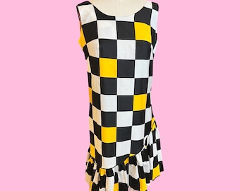 Vintage 1960s Mod Go Go Yellow Black Check Print A Symmetrical Ruffle Hem Sleeveless Shift Dress
