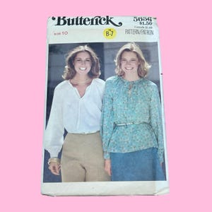 May include: Vintage Butterick sewing pattern, size 10, featuring two women modeling blouses. The pattern number is 5656, and the price is $1.50. The cover shows a white blouse and a blue floral blouse.