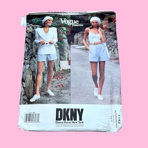 May include: A vintage DKNY Vogue Patterns sewing pattern. The pattern features a design for shorts and a jacket. The cover includes images of a model wearing the shorts and jacket. The pattern is labeled with the DKNY and Vogue Patterns logos.