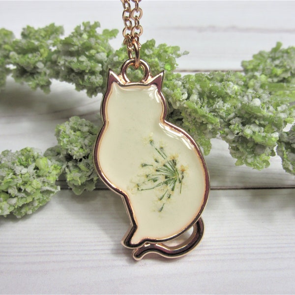 Rose gold plated cat necklace with real flowers preserved in resin
