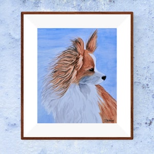 May include: Watercolor painting of a brown and white papillon dog with long, flowing hair. The dog is looking to the right of the image, with a blue background.