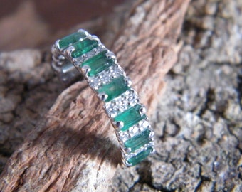 Silver ring, emeralds and moissanites