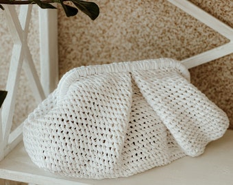 White clutch purse. Stunningly Stylish Knitted Cloud Bag. Knitted cloud bag. Cloud Bag. Voluminous Clutch. Lightweight clutch bag.