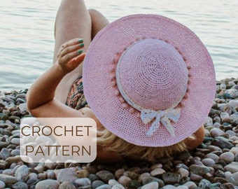 Modèle de chapeau de soleil pdf au crochet pour femme. Modèle de crochet à télécharger au format PDF. Modèle de chapeau de soleil en paille de raphia au crochet.