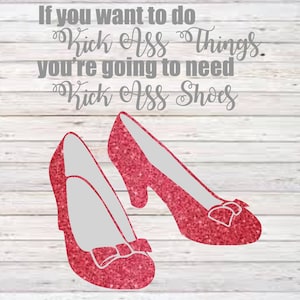 May include: A pair of red glitter high-heeled shoes with a bow on the toe. The shoes are on a white wood background. The text "If you want to do Kick Ass Things you're going to need Kick Ass Shoes" is written in grey above the shoes.