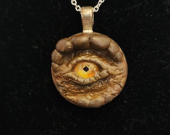 T-Rex oog ketting