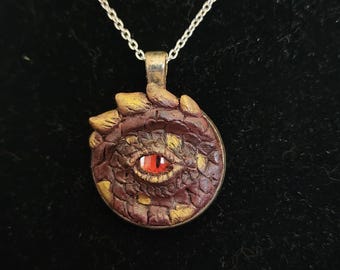 Rode en gouden drakenoog ketting