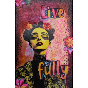 May include: Mixed media artwork featuring a woman with yellow face paint and red lips, adorned with flowers. The words "Live" and "fully" are written in colorful script. The background has pink and red patterns with floral accents.