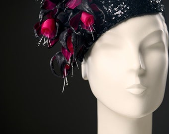 Fascinator hat with silk flowers fuchsia