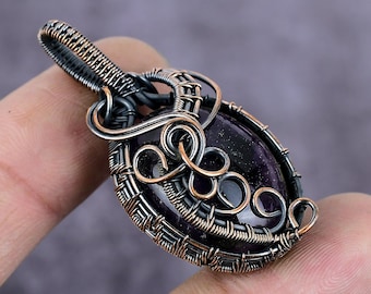 Colgante de amatista hecho a mano con alambre de cobre - Joyería bohemia