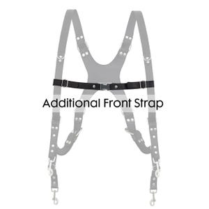May include: A black leather harness with silver-tone hardware and an additional front strap. The text "Additional Front Strap" is printed in black below the strap.