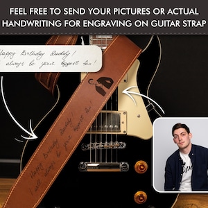 K&ouml;nnte beinhalten: Ein brauner Ledergitarrengurt mit eingraviertem Text "Happy Birthday Daddy! I will always be your biggest fan!". Der Gurt ist &uuml;ber einer schwarzen E-Gitarre drapiert. Das Bild enth&auml;lt auch ein Foto eines Mannes.