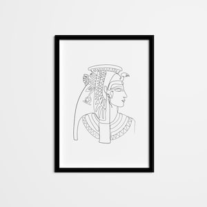 May include: Black and white line art print of an Egyptian queen wearing a headdress with a cobra and a vulture. The print is framed in a black frame.