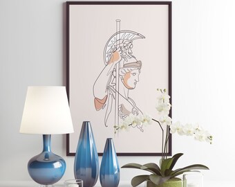 May include: A framed print of a line drawing of a woman wearing a helmet, with a vase of white orchids and a blue ceramic lamp on a white surface.