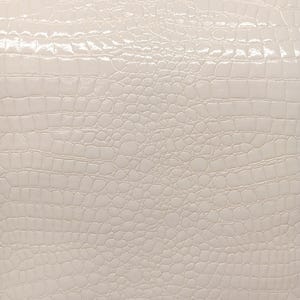 May include: White faux leather with a crocodile embossed pattern.