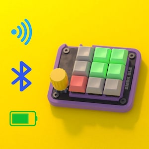 May include: A purple and black mechanical keyboard with a yellow knob and various colored keycaps. The keyboard has the text "ZM9K BLE" printed on the side. Wireless connectivity icons and a battery icon are displayed on a yellow background.