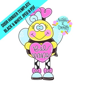 May include: A yellow bee with black stripes holding a pink heart that says "Be Mine". The bee has blue wings, black and white polka dot legs, and pink bows on its feet.
