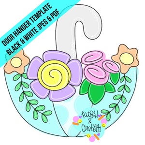 Puede incluir: Un colgador de puerta con forma de paraguas azul con un asa gris y flores de colores. Las flores son rosas, moradas, amarillas y naranjas. El texto "kitsch & confetti" está en la parte inferior del paraguas.