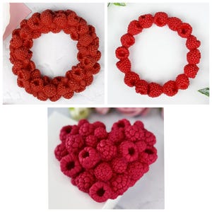 May include: Three red raspberry-shaped silicone moulds. One mould is a circle, one is a heart, and one is a wreath.