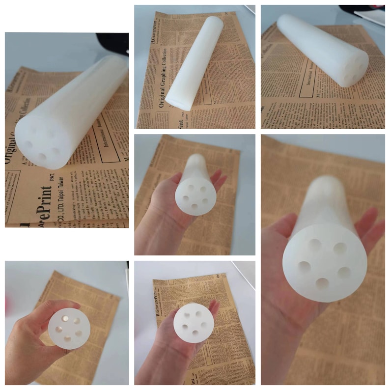Puede incluir: Tubo de pl&aacute;stico blanco con cinco agujeros en un patr&oacute;n circular. El tubo mide aproximadamente 25 cm de largo y 2,5 cm de di&aacute;metro.