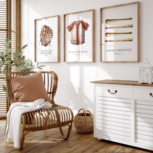 May include: Three framed prints with baseball-themed artwork and inspirational quotes. The prints feature a baseball glove, a baseball jersey, and baseball bats. The quotes are "I am fearfully and wonderfully made", "God is with me always", and "I am God's masterpiece".