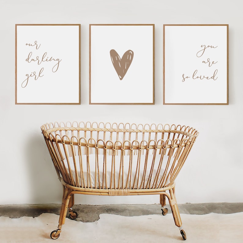 Nursery wall art set of 3 for a baby girl room with the nursery quote Our Darling Girl You Are So Loved