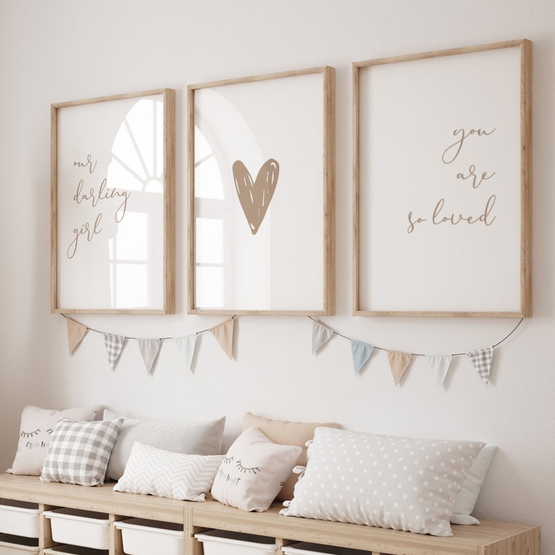 Nursery wall art set of 3 for a baby girl room with the nursery quote Our Darling Girl You Are So Loved