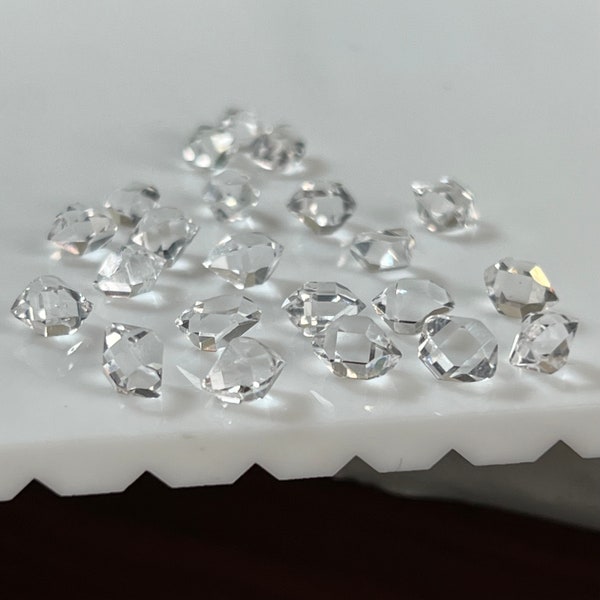 Herkimer diamond quartz crystals , 6 to 7 mm