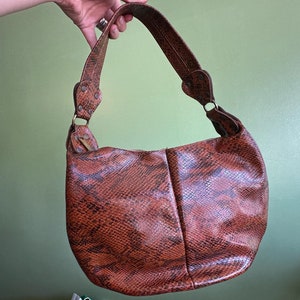 Monedero bohemio hippie de piel de serpiente de los años 70