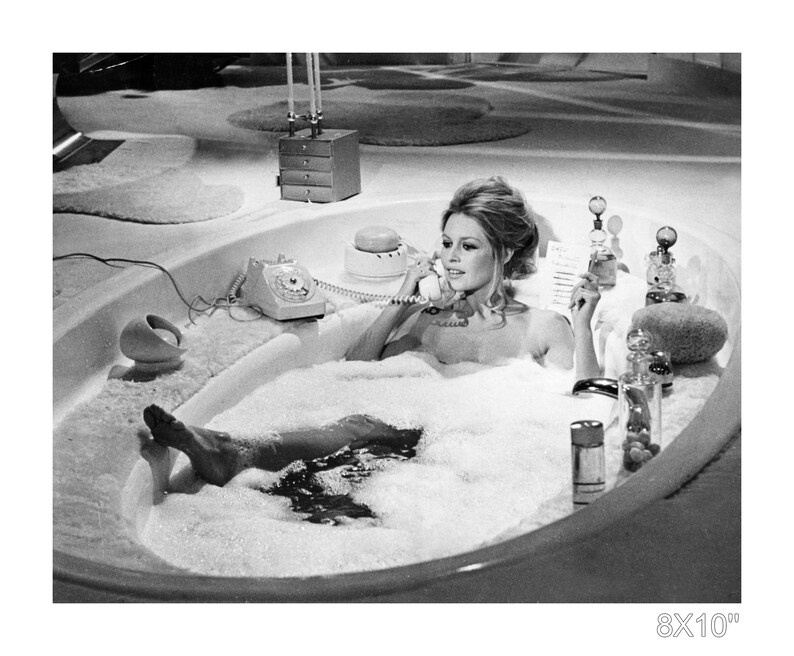 Photo of Brigitte Bardot talking on the phone in the bathtub. Etsy