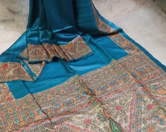 Madhubani paint on pure Ghicha Tassaur saree in teal blue with running Blouse piece..
