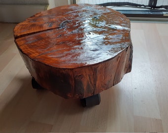 Flower table, coffee table, side table made of tree slices on wheels